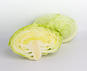 Cut cabbage on white background