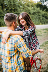 Man and woman kissing, romantic date, retro bikes