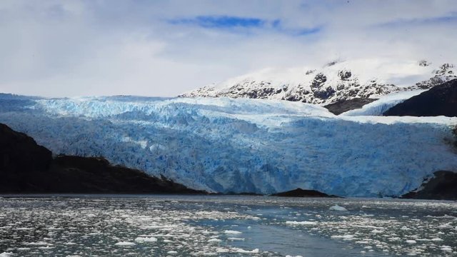 Glacier bay national park in Alaska with iceberg and glacier wall