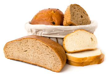 Half a loaf of bread and slices in basket on white