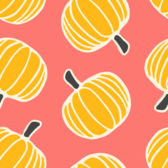 Hand drawn seamless pattern with pumpkins in orange, cream and black on pink background.