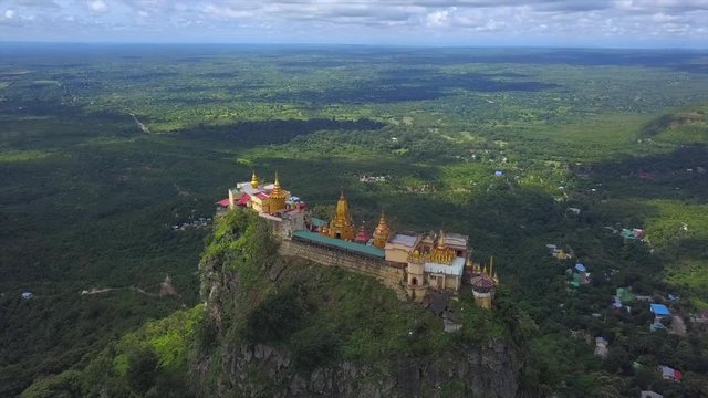 Aerial view from the drone on the Mount Popa,home of Nat the Burmese mythology ghost this place is the old volcano in Bagan, Myanmar
