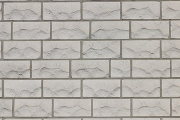 Weiße Klinkersteinmauer/ Sandstein - Fassade eines Gebäudes