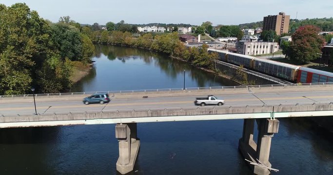 A profile aerial view of traffic on the Officer McCray Rob Memorial Bridge over the Youghiogheny River in Connellsville, PA.	 	