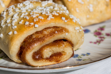 Cinnamon rolls on the plate, macro