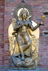 Obraz premium Ancient statue in Royal Palace at Mul Chowk in Patan, Kathmandu Valley, Nepal