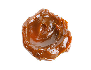 Delicious caramel sauce on white background