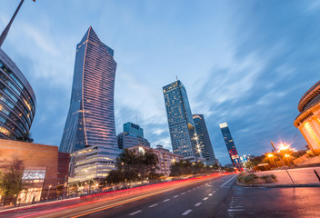 Warsaw, capital of Poland, modern skyscrapers on Emilii Plater street in the evening