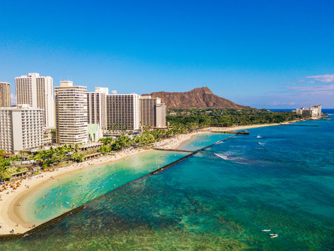Amazing aerial view of the Diamond Head by the park and Waikiki beach. Together with the Honolulu city skyline