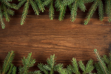 Christmas wooden background with green fir-tree branches. - 177678779
