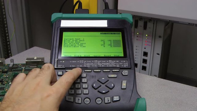 IT engineer test and maintenance telecom equipment in server room, datacenter