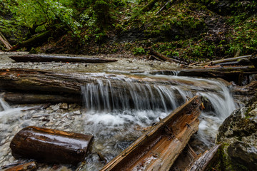 Waterfall from ravine in autumn, long exposure