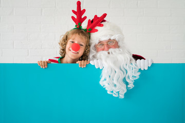 Santa Claus and reindeer child