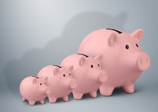 Piggy banks of different sizes, savings growth concept