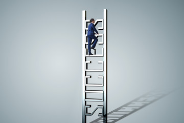 Businessman climbing the career ladder of success
