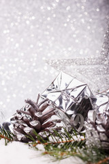 Christmas composition of Christmas tree toys on a silver background