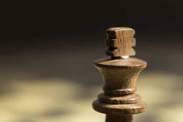 A white king chess piece