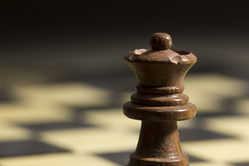 A white king chess piece