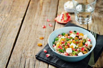 Barley pomegranate raisins feta salad
