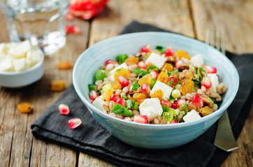 Barley pomegranate raisins feta salad