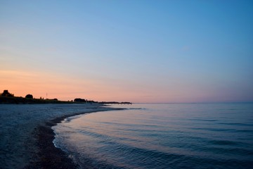Obraz premium Sunset over the beach