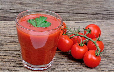 Tomato juice on wooden table