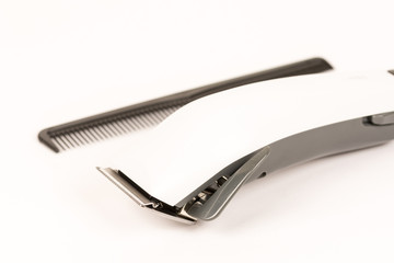 White haircut trimmer isolated above white background with copy