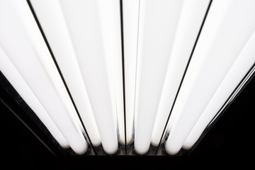 LED fluorescent light tubes closeup. Professional lighting equipment for photo or video production.