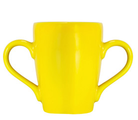 Yellow tea cup isolated on white