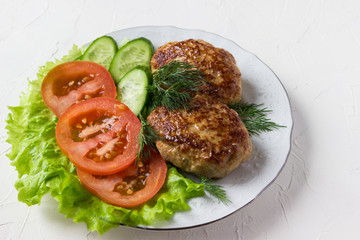 Fried cutlets  and vegetable.