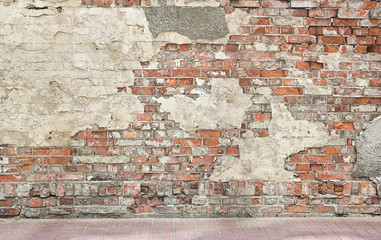 fond de mur grunge, briques et morceaux de plâtre