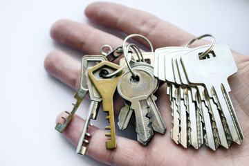 A bunch of door keys on hand