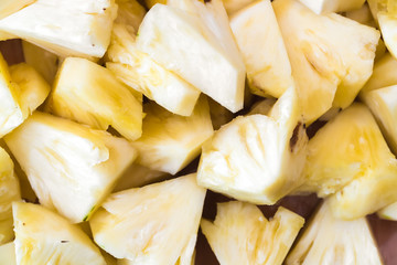 Sliced Pineapple on Chopping Board