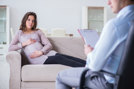 Pregnant woman visiting psychologist doctor