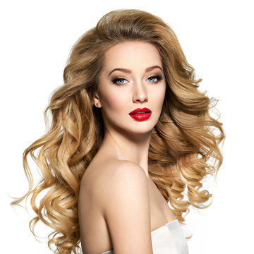 Pretty woman with long  hair and red lips.