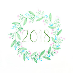 Fototapeta na wymiar Happy new year 2018 on watercolor hand painting flowers wreath over white background, new year greeting card, banner