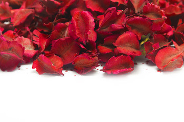 A pile of autumn leaves with red color paint is dried leaves on a white color background. Floral and leaves concept. copy space for decorative writing text.