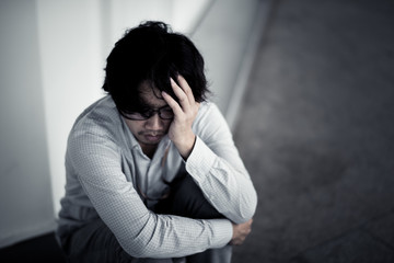 business man is stressed from his work. depression and anxiety concept.