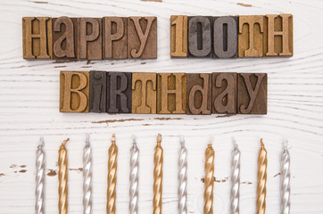 Happy 100th Birthday Spelled in Type Set