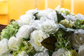 White fake roses in the wedding