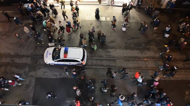 People on Istiklal Street at night in Istanbul, Istiklal Street is the most popular destination of Istanbul for shopping and entertainment.