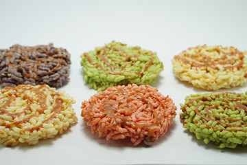  Rice cracker (Thai cuisine) isolated on white background. Multicolor rice cracker made from herbal coloring.