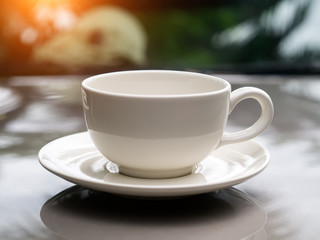 Coffee cup in the morning time.
