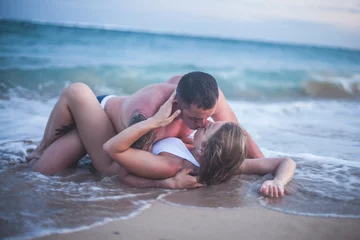 Erotic couple at the beach, sea view. Traveling at Bali. © petunyia