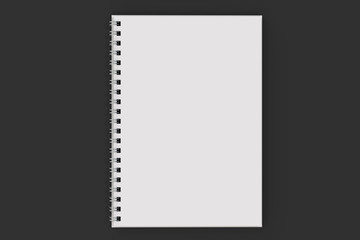 Opend notebook spiral bound on black background