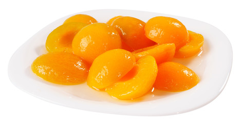 Apricot halves on plate isolated