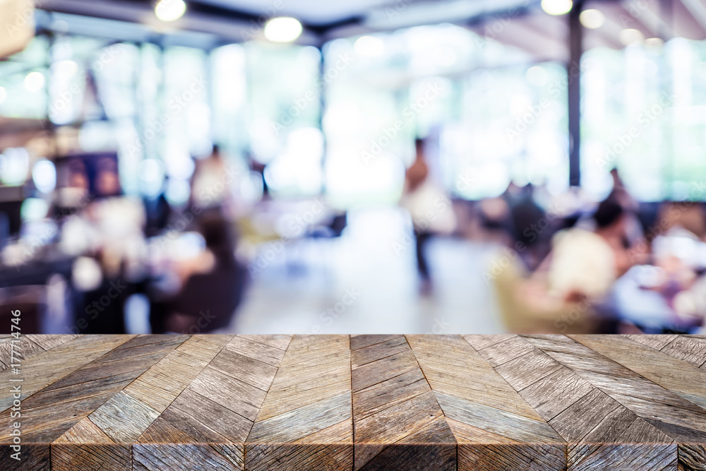 Aufkleber empty rustic old wood table and blurred people dining at restaurant with bokeh light background. pro