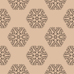 Brown floral seamless design on beige background