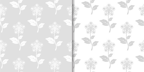 Light gray floral backgrounds. Set of seamless patterns