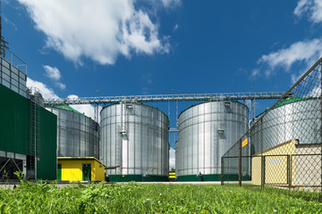 Modern large granary. Large metal silos.